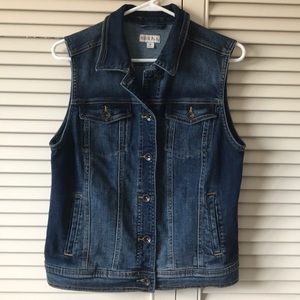 Denim vest, nicely broken in. Metal buttons